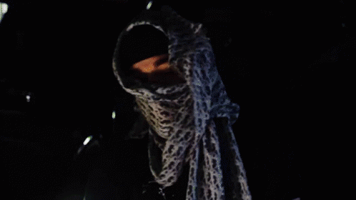 Yeat Covered Face Rapping GIF