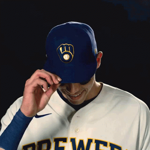 Yelich Tips Cap Smiling GIF