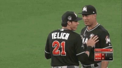 Yelich Victory Laugh With Teammate GIF
