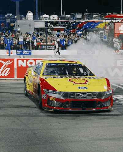 Yellow And Red Race Car Number 22 GIF
