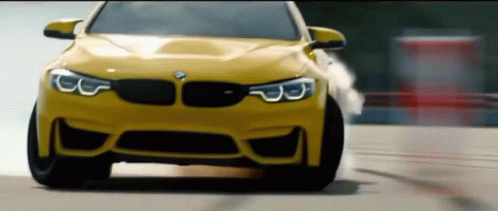 Yellow BMW M3 Drifting on Road