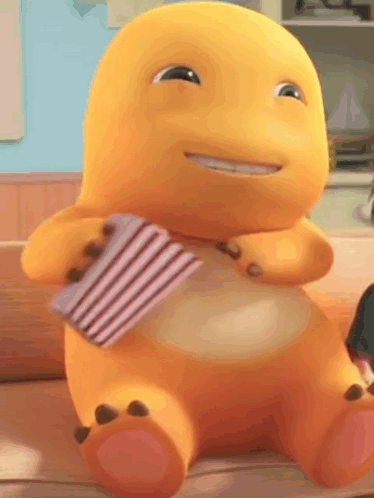 Yellow Cartoon Character Holding Box of Popcorn