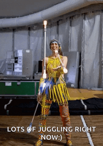 Yellow Dress Woman Juggling Stick Lots of Juggling