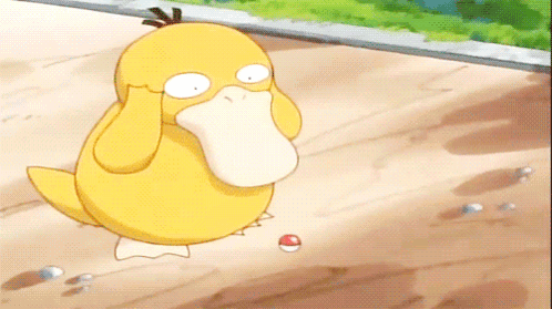 Yellow Duck Holding Pink Heart