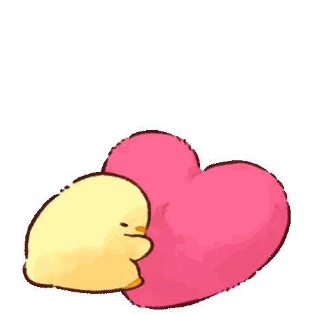 Yellow Duck Lying on Pink Heart