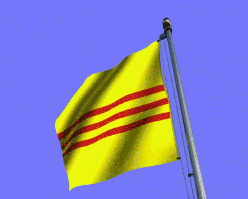 Yellow Flag With Red Stripes Waving in Blue Sky