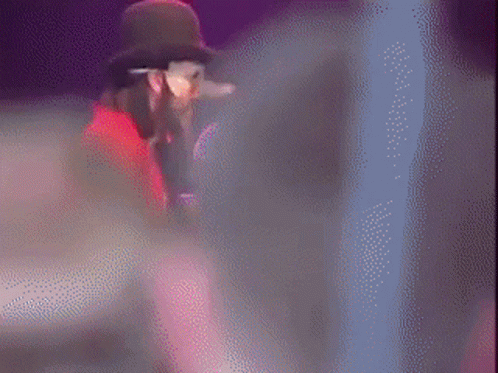 Yellow Guitarist Next to Red Shirt Man