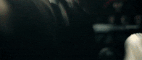 Yellow Hellcat Drifting Between Warehouses GIF