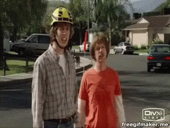 Yellow Helmet Man Next to Red Shirt Man