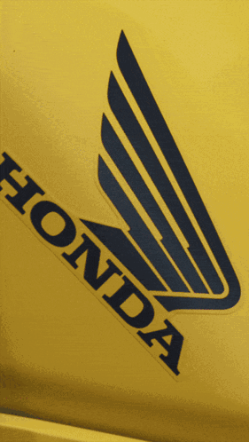 Yellow Honda Logo With Blue Wing