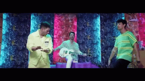 Yellow Jacket Man Playing Guitar Two Dancing Men Colorful Wall