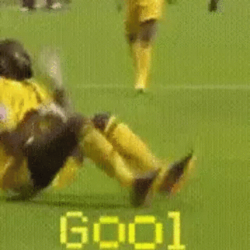 Yellow Jersey Soccer Player Laying On Ground GIF