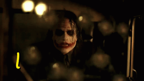 Yellow Letter L Next to Joker in Car