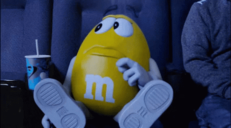 Yellow M&Ms Feed Me GIF