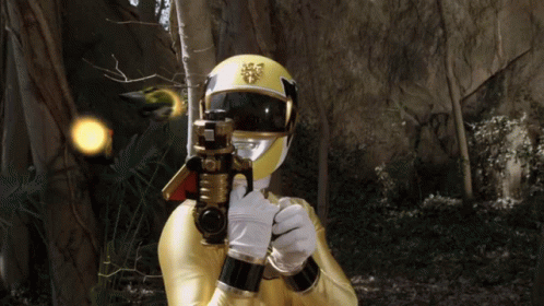 Yellow Power Ranger Holding Gun GIF
