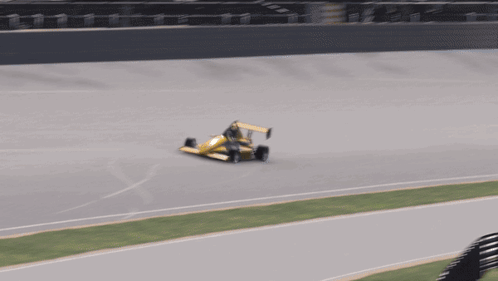 Yellow Race Car Driving