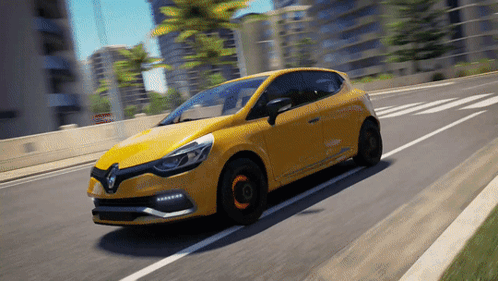 Yellow Renault Car Driving Down City Street