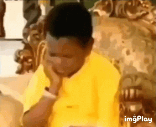 Yellow Shirt Man Covering Face on Couch Imgplay