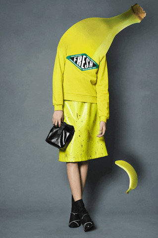 Yellow Spinning Banana Costume Fashion GIF