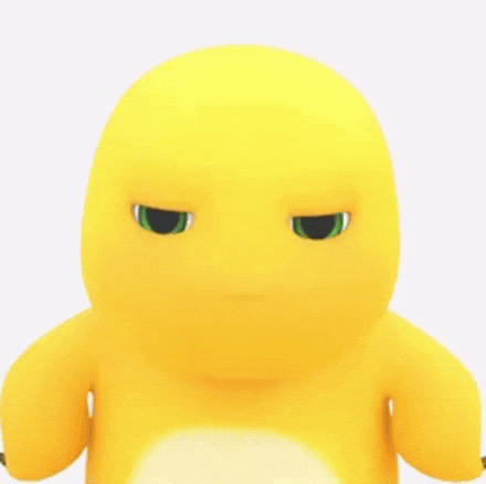 Yellow Stuffed Animal Green Eyes Making Funny Face