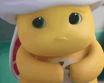 Yellow Stuffed Animal Green Eyes White Hat Looking GIF