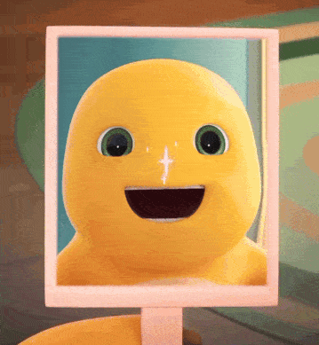 Yellow Stuffed Animal Smiling In Mirror GIF