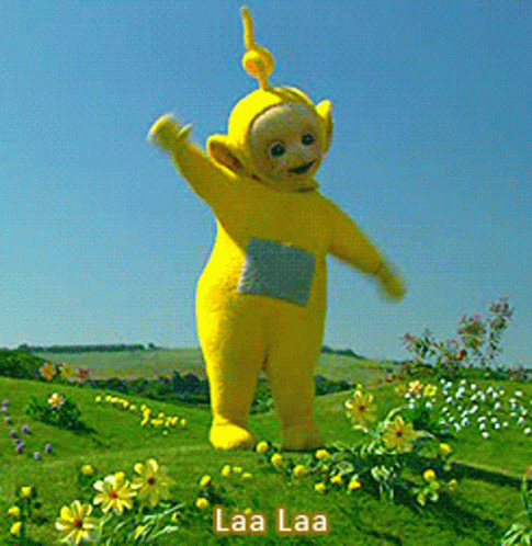 Yellow Teletubbies Character In Yellow Flowers GIF