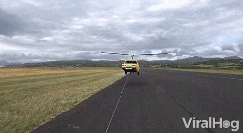 Yellow Truck Towed By Helicopter ViralHog GIF