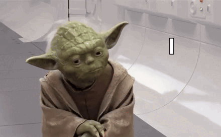 Yoda From Star Wars Is Standing In A Room With A White Wall . GIF