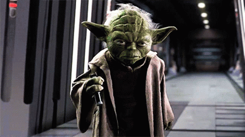 Yoda From Star Wars Is Walking Down A Hallway GIF
