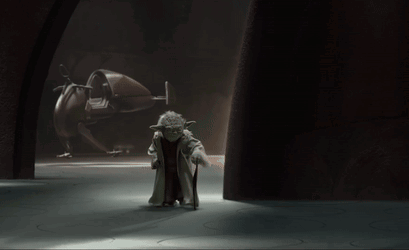 Yoda Statue with Cane in Dark Room