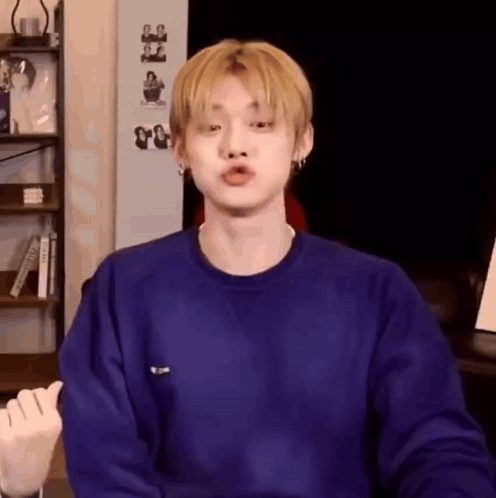 Young Blonde Man Blue Sweater Funny Face