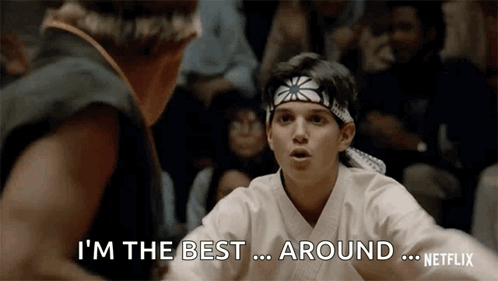 Young Boy And Man In Karate Uniforms Talking GIF