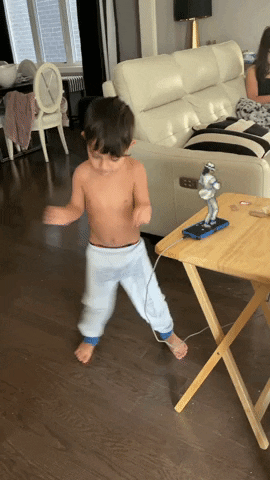 Young Boy Crazy Dancing In The Living Room GIF