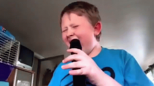 Young Boy Crying While Singing