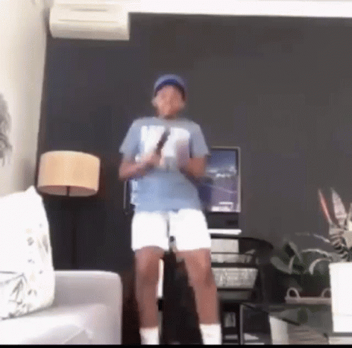 Young Boy Dancing With Wii Remote