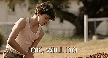 Young Boy Digging In Dirt GIF