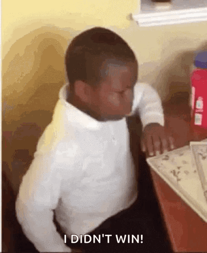 Young Boy Eyes Closed Saying I Didn't Win GIF
