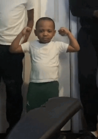 Young Boy Flexing Muscles Next To Man And Woman GIF