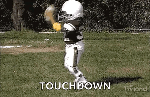Young Boy Football Player Running Touchdown GIF