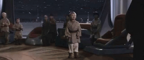 Young Boy Holding Light Saber