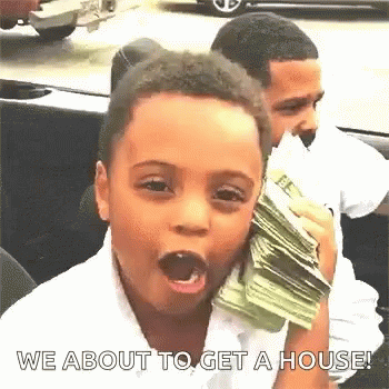 Young Boy Holding Money in Mouth Talking on Phone