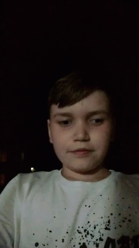 Young Boy in Army Shirt