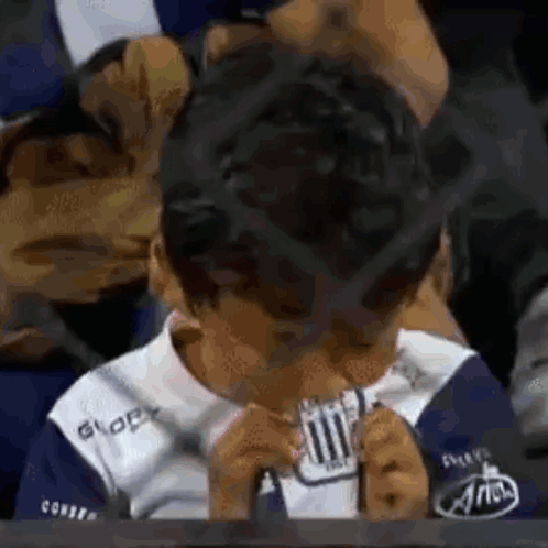Young Boy In Blue White Shirt Eating Paper GIF