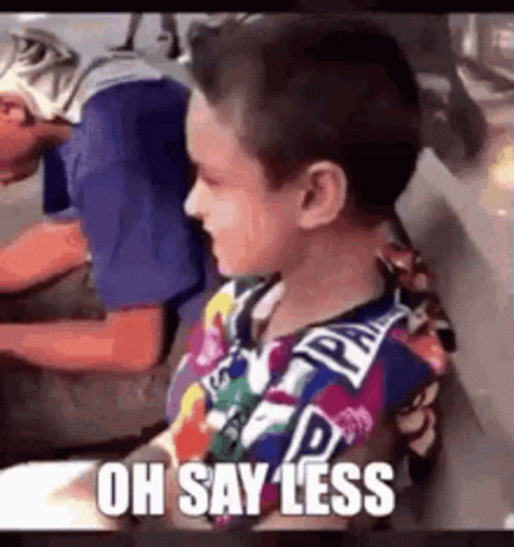 Young Boy In Colorful Shirt Says Oh Say Less Next To Man In Blue Shirt GIF