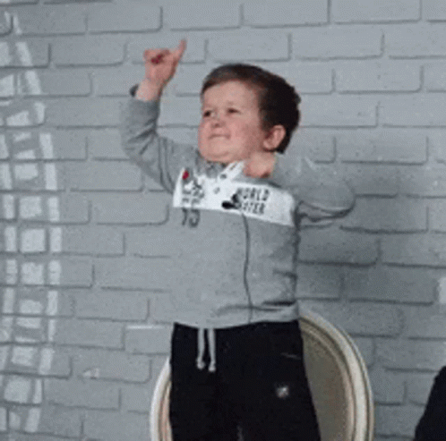 Young Boy In Gray Sweatshirt With World GIF