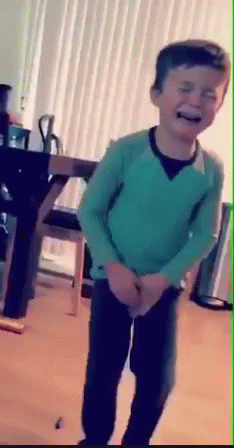 Young Boy in Green Sweater