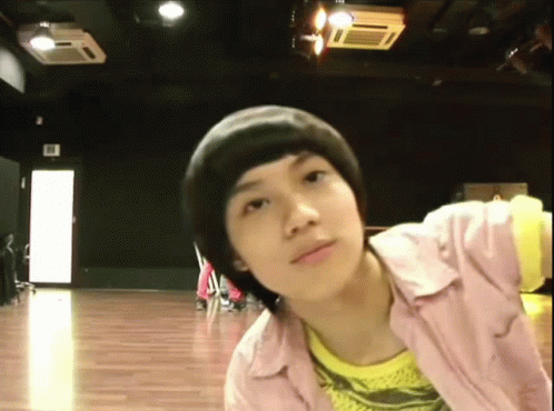Young Boy in Pink and Yellow Shirts