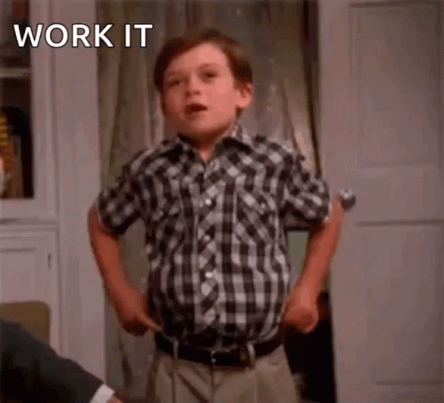Young Boy in Plaid Shirt Saying Work It