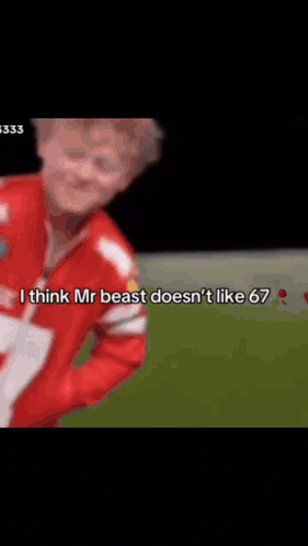 Young Boy In Red Jacket Saying Age GIF